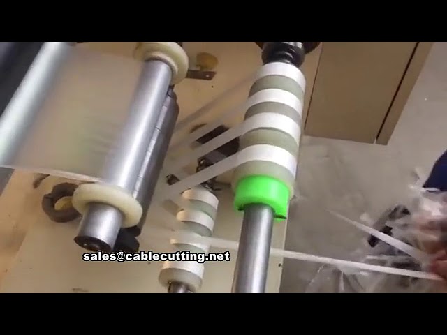 300mm幅フィルム対応！高性能テープ巻き取り機 | 工場自動化向け